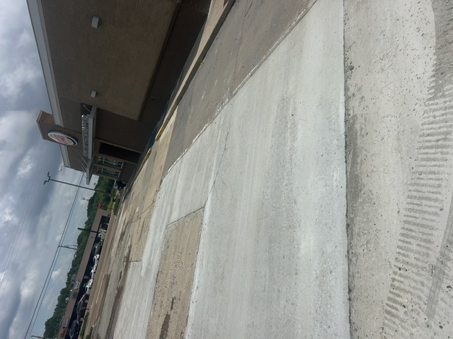 Finished concrete pad at Burger King after Quick and Clear completed work