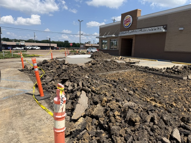 Burger King parking lot torn up during concrete reconstruction