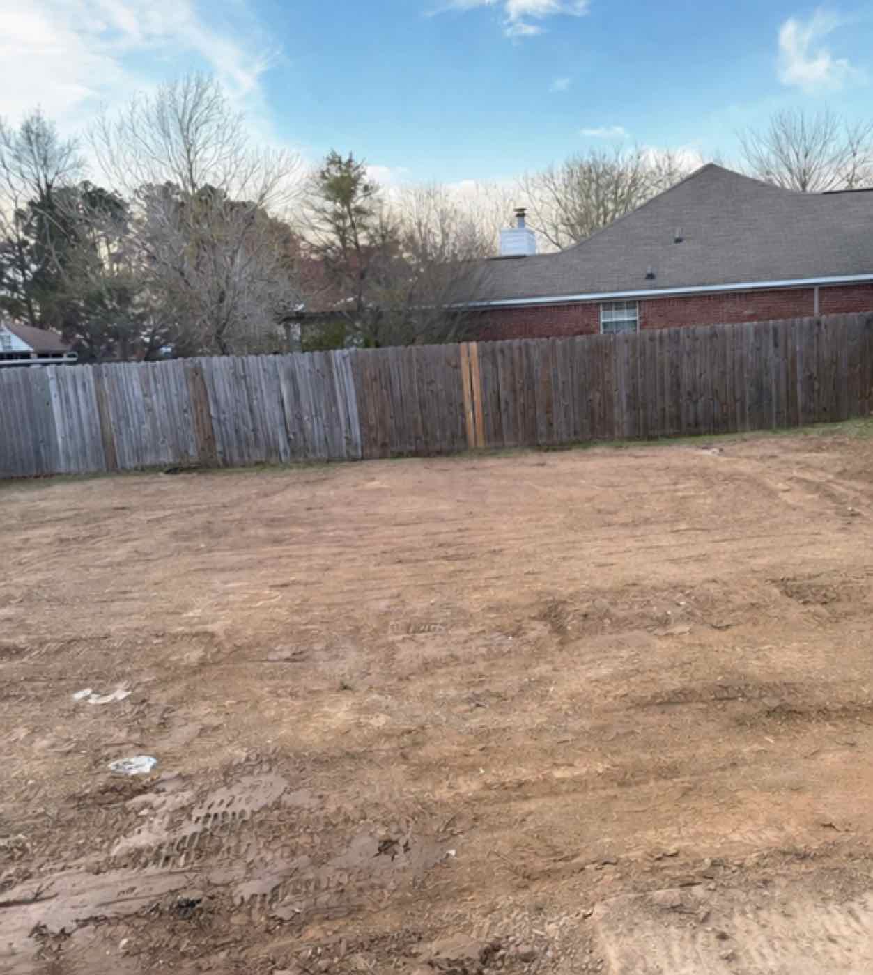 Same backyard with pool removed and area filled and graded